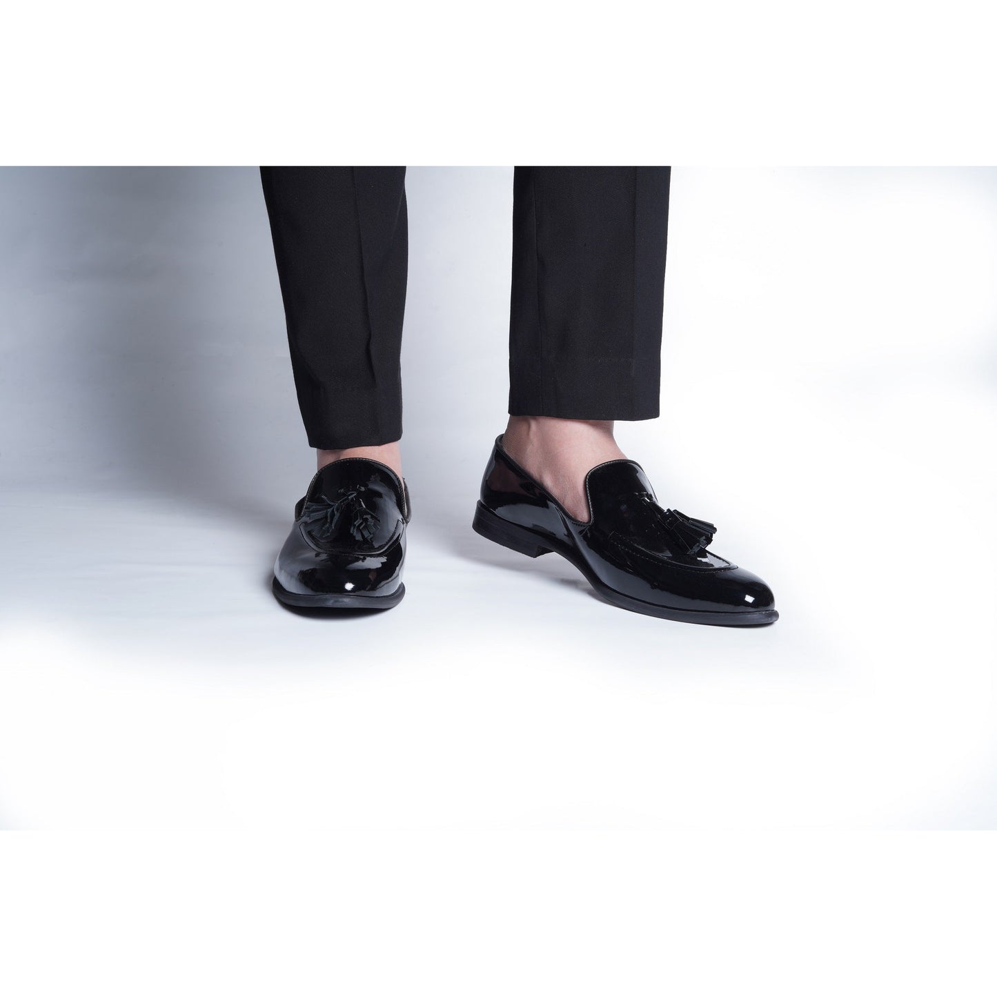 CLASSIC PATENT SLIP ONS WITH TASSELS