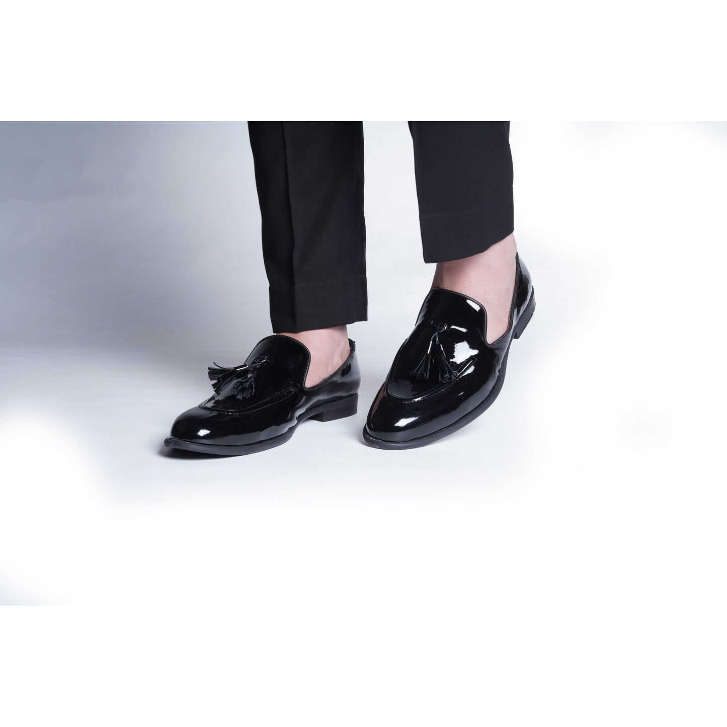 CLASSIC PATENT SLIP ONS WITH TASSELS