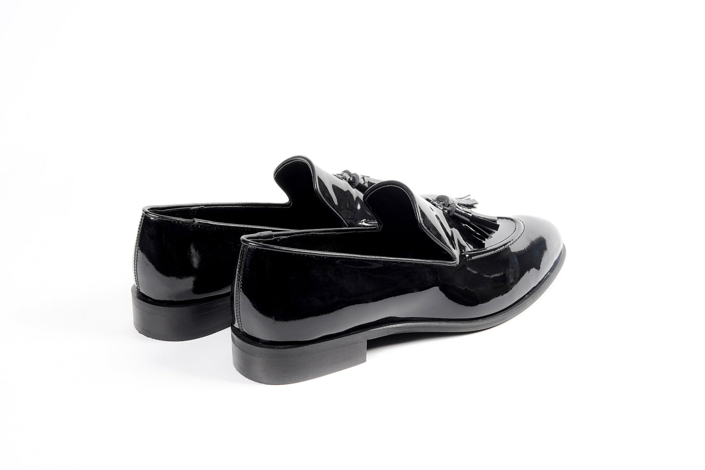 CLASSIC PATENT SLIP ONS WITH TASSELS